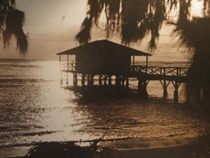 Source: E. H. Dortmund "Pier at Queen Liliuokalani's home at Waikiki, 1919" Bishop Museum, Wikimedia Commons. web address, accessed 13 August 2015. Public Domain.  